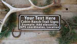 custom cabin metal sign with brown background and white text