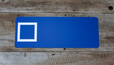 custom blue square ski sign with a blue background and white text