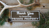 metal sign that says 'thank you for respecting private property' in white text with a brown background