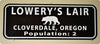 metal sign with white text that says 'lowery's lair' on a brown background